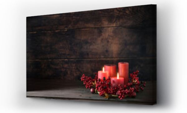Wizualizacja Obrazu : #665239195 Second Advent with two lit red candles in a wreath from berries with Christmas decoration against a dark rustic wooden background, copy space, selected focus