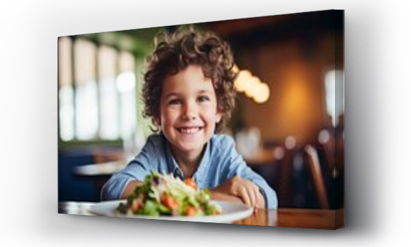 Wizualizacja Obrazu : #666725333 Little boy enjoys his breakfast with coleslaw and salad.