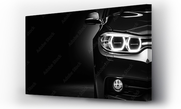 Wizualizacja Obrazu : #675444889 Unbranded generic black sport car isolated on a dark background