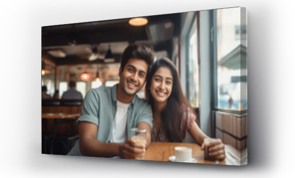 Wizualizacja Obrazu : #675655091 Young indian couple or friends taking taking tea or coffee at restaurant