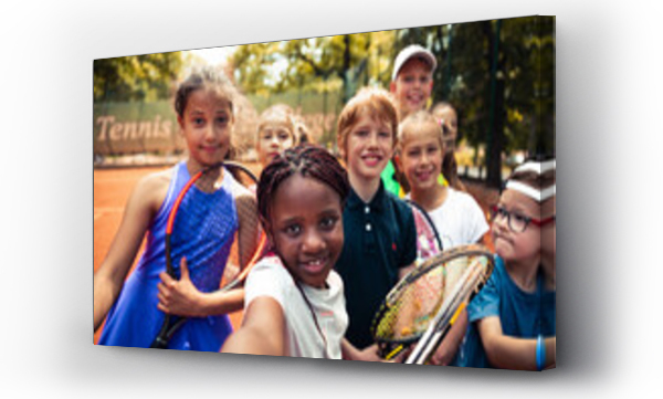 Wizualizacja Obrazu : #676797721 Portrait young children tennis players looking at camera taking selfie
