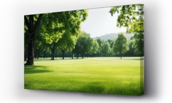 Wizualizacja Obrazu : #680445116 Beautiful blurred background image of spring nature with a neatly trimmed lawn surrounded by trees against a blue sky with clouds on a bright sunny day.
