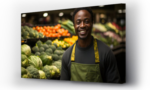 Wizualizacja Obrazu : #683798167 A happy African male trader standing in a market place