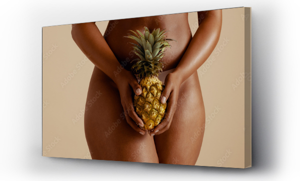 Wizualizacja Obrazu : #686030916 Body positivity: Sensual woman embracing wellness with pineapple