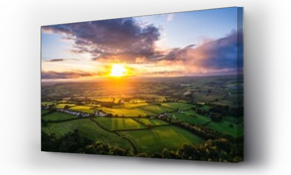 Wizualizacja Obrazu : #689410250 Sunset over Fields and Farms from a drone, Green Castle Wood, River Towy, Carmarthen, Wales, England, United Kingdom, Europe