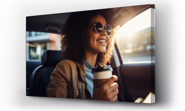 Wizualizacja Obrazu : #692994519 Happy young woman holding cup of coffee to go driving her car, cheerful woman driving car and drinking coffee