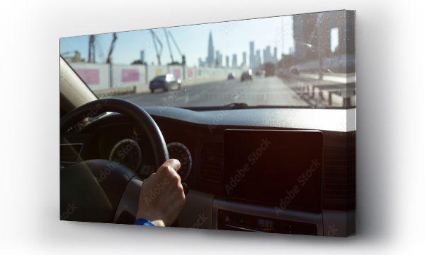 Wizualizacja Obrazu : #695310784 Hands on steering wheel driving car in city