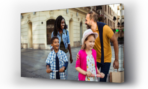 Wizualizacja Obrazu : #700301535 Multicultural Family Enjoying a Walk in the City Square