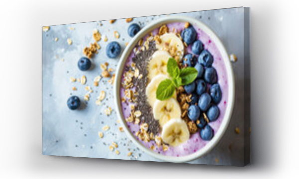 Wizualizacja Obrazu : #700597439 ?lose-up of a healthy vegan breakfast. A plate with healthy superfood - fresh berries, fruit yogurt, chia seeds, granola and banana slices on pastel table. 