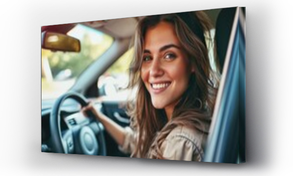 Wizualizacja Obrazu : #703574550 Happy young female sitting in the drivers seat of a car