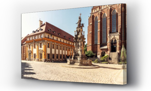 Wizualizacja Obrazu : #709603270 Poland, LowerSilesianVoivodeship, Wroclaw,Statue of John of Nepomuk in front of Collegiate Church of Holy Cross and St Bartholomew