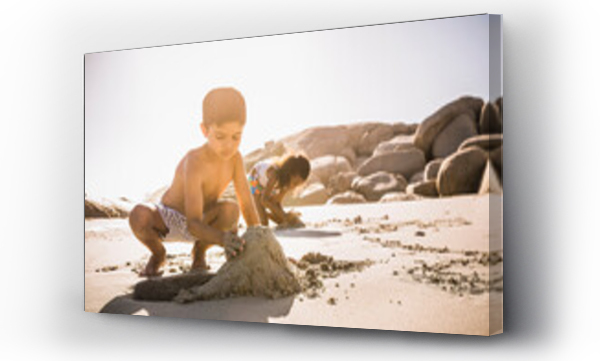 Wizualizacja Obrazu : #711570265 Mixed race family having fun playing on the beach. Cape Town, South Africa