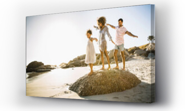 Wizualizacja Obrazu : #711571075 Mixed race family having fun playing on the beach. Cape Town, South Africa