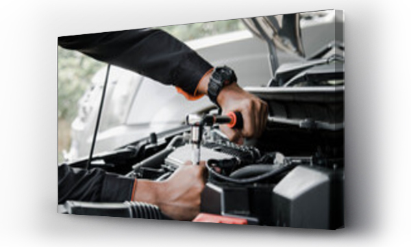 Wizualizacja Obrazu : #726280664 Mechanic fixing a car at home. Repair and service.