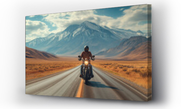 Wizualizacja Obrazu : #726658164 A male biker rides a motorcycle on a deserted road