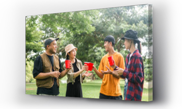 Wizualizacja Obrazu : #731252595 Cheers! Group of asian people friend party camping in nature making toasting with soft drink and beer red cup. Hangout party outdoor in campsite nature forest background on holiday weekend vacation