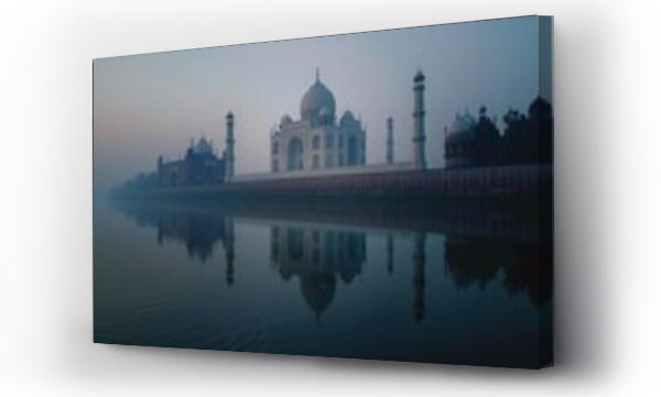 Wizualizacja Obrazu : #741548276 Misty Morning at the Taj Mahal Reflecting on Water. A serene, misty morning view of the Taj Mahal with its stunning reflection on the surface of the water, conveying a peaceful atmosphere.