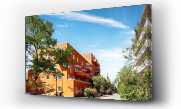 Wizualizacja Obrazu : #748252711 Residential area with ecological and sustainable green residential buildings, low-energy houses with apartments and green courtyard