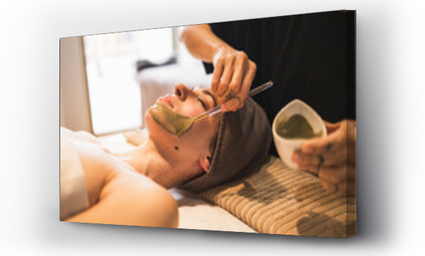 Wizualizacja Obrazu : #751862958 Relaxing facial treatment at a wellness spa