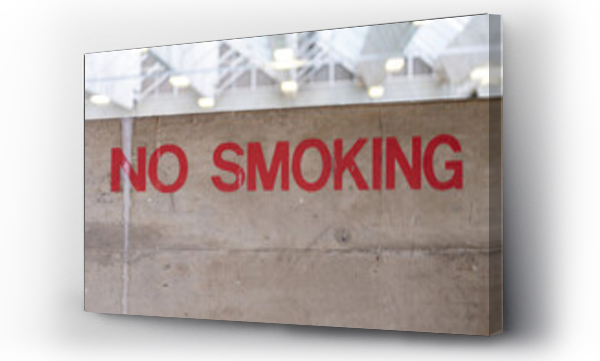 Wizualizacja Obrazu : #753957159 A hand-painted no smoking sign in a large building