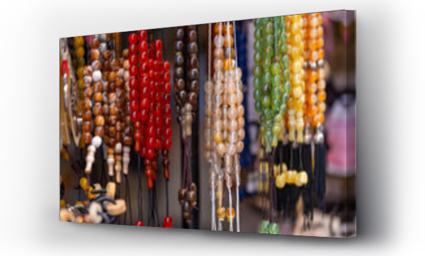 Wizualizacja Obrazu : #759314165 Colorful prayer beads hanging in the stall for sale