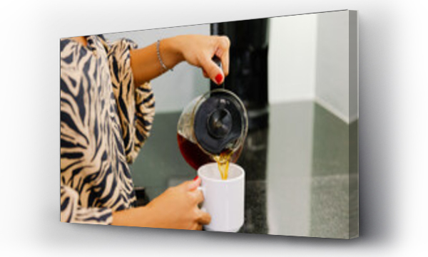 Wizualizacja Obrazu : #759356504 Close-up of a woman pouring a cup of coffee