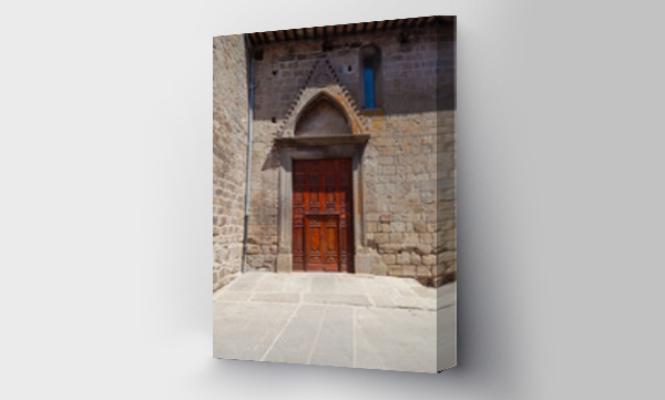 Wizualizacja Obrazu : #760506516 Ancient closed wooden church door, vertical shot at Santa Maria Assunta in Cielo, Vitorchiano.