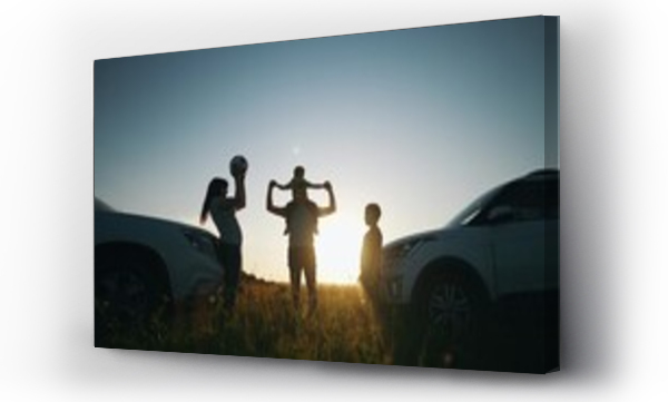 Wizualizacja Obrazu : #767835839 happy family play ball next to car silhouette a camping vacation. Road trip fun. happy family adventures with car travel and camping silhouette. car travel and silhouette camping expedition sunset